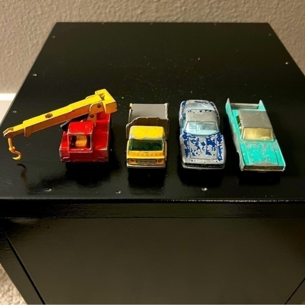 Vintage bundle of four Matchbox cars.